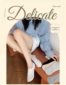 Detail of thin invisible cotton socks with vertical stripes and anti-slip silicone pads