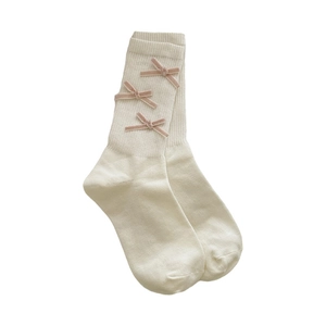Creamy white mid-calf socks featuring three soft pink velvet bows in ballet style