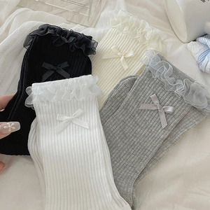 Sweet ballet style socks with lace trim and silk bows in black, white, and grey colors