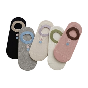 Five pairs of cotton invisible boat socks with button detail in assorted pastel colors