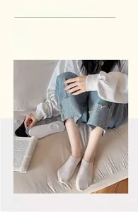 Detailed knit texture of seamless low-cut invisible socks in neutral color tones