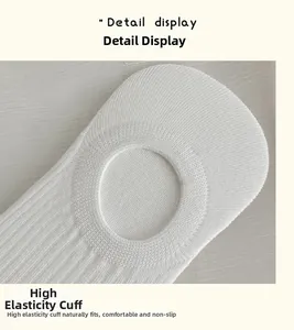 Detail view of the high-elasticity cuff on a white invisible cotton sock for women