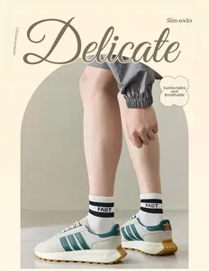 Detailed close-up of breathable cotton blend socks with elastic ribbed cuffs and stripes