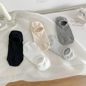 Five pairs of seamless low-cut cotton socks for women in minimalist neutral solid colors