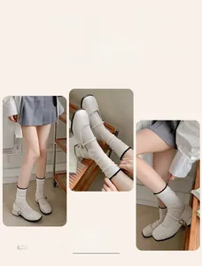 Detail view of white lace breathable socks paired with Mary Jane shoes for a preppy style
