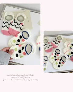 Detail of assorted patterns on low-cut invisible cotton socks for women with anti-slip grip