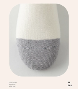 Macro detail of breathable knit fabric and seamless toe design on men's cotton sports socks