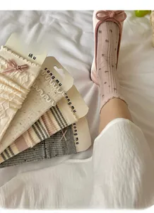Detail of high elasticity cream lace socks with bowknot and sweet lolita ruffles
