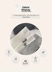 Detail showing premium ribbed cotton texture and bow embroidery on these mid-calf socks