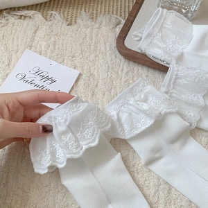 White cotton mid-calf socks with delicate floral lace trim and sweet Lolita style details