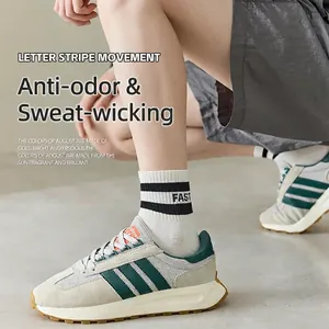 Men's retro striped cotton socks featuring FAST lettering for athletic sports wear