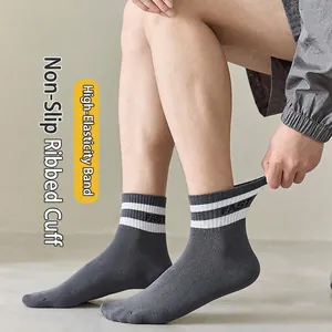 Men's dark grey crew athletic socks with white stripes and FAST lettering detail