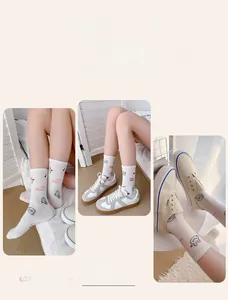 Close-up of cute rabbit and cool sheep patterns on white double needle woven cotton socks