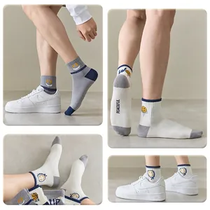 Men's cotton athletic crew socks with graffiti smiley face and PEACEFUL typography