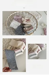 Detailed view of cream lace socks with bows and various Morandi patterns in a basket