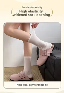 Detail of high-elasticity wide cuffs on white mesh crew socks for a non-slip fit