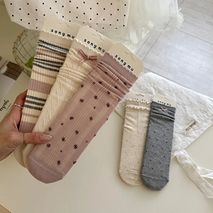 Set of sweet cream lace socks with bows and floral patterns in various colors