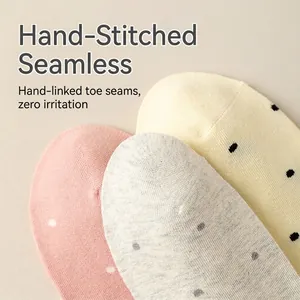 Set of polka dot cotton socks in pink, grey and yellow with flat-seam toe craft