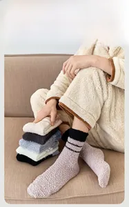 Thick coral fleece winter socks with ribbed cuffs displayed in various warm colors