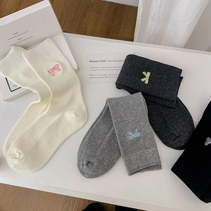 Chic women's crew socks with embroidered bows in white, grey and black colors