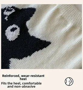 Macro detail of reinforced heel on cute cat socks showing durable knit and non-slip fit