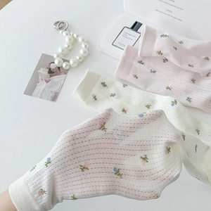 Women's floral knit mesh socks in beige and pink with delicate floral embroidery