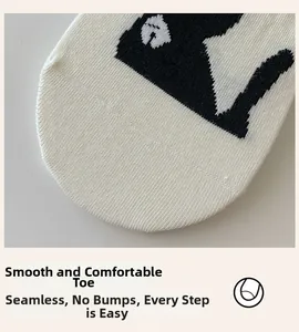 Detail of seamless toe construction on beige cat socks for comfort and smooth fit