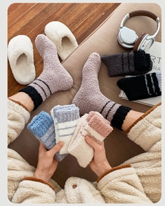 Detail of warm thickened coral fleece socks in multi-color pack for home lounging