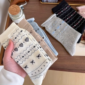 Women's vintage cotton blend crew socks with sweet heart and bow tie patterns
