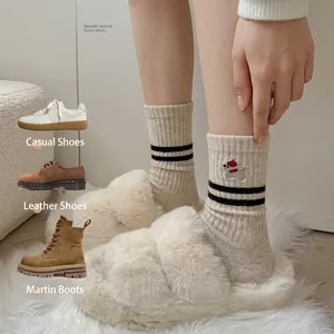 Winter set with striped oatmeal wool socks featuring bear embroidery and plush slippers