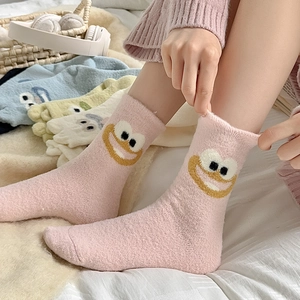 Thick warm coral fleece socks for women featuring cute cartoon monster embroidery for winter
