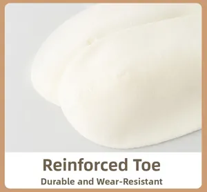 Macro detail of the reinforced toe area on premium combed cotton crew socks for men