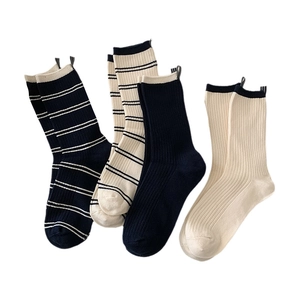 Vertical ribbed cotton socks set with striped back tabs in four different colors