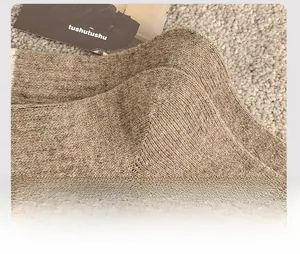 Detailed close-up showing the reinforced heel design of the brown wool blend thermal sock