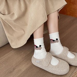 Women's cozy wool socks with cute dog embroidery and stylish grey Mary Jane shoes