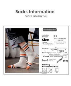 Detail showing white mid-tube cotton socks with orange stripes and embroidery, size 36-42