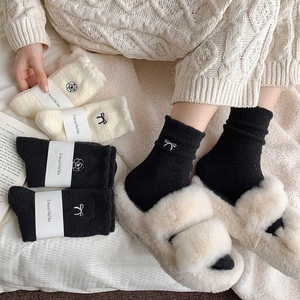 Thick warm coral fleece socks with bow embroidery in black and cream white colors
