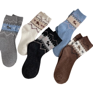 Five-pack of vintage Fair Isle wool socks with dog motifs and thick thermal knit for winter