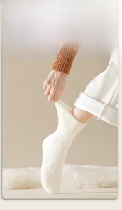 Close-up of white mink fleece sock showing high elastic cuff and fluffy winter texture