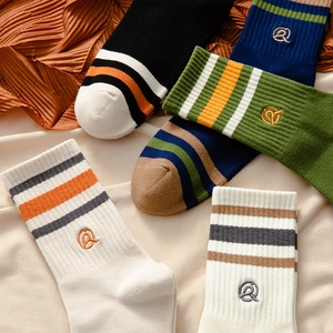 Five pairs of men's striped cotton blend crew socks with vintage embroidery and ribbed cuffs