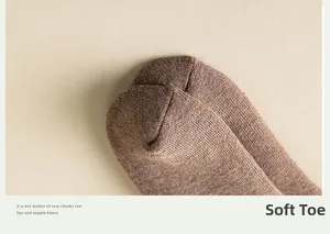 Detailed close-up of thickened brown knitted sock toe with seamless sewing and soft texture