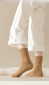Close-up of thick plush mink velvet crew socks in warm brown for cozy winter home wear