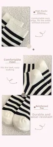 Detail view of high elasticity cuffs, cozy heel, and reinforced toe on striped cotton socks