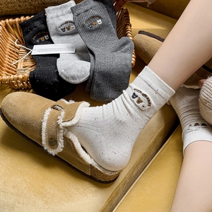 Cozy crew socks with embroidered bears and Turn off away text in various colors