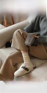 Detailed knit texture of thick winter crew socks in classic solid colors for warmth