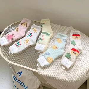 Five pack of thick coral fleece socks with cute cartoon patterns and soft plush texture