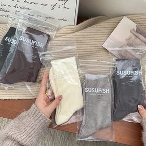 Thick warm winter crew socks for women featuring vertical rib knit in five neutral colors