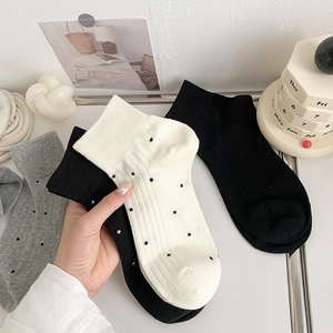 Japanese style cotton ankle socks in solid black and white polka dot patterns
