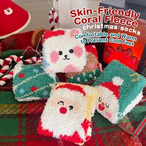 Festive Christmas coral fleece socks featuring cute cartoon patterns for winter warmth