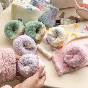 Thick warm coral fleece crew socks with cute cartoon patterns in pastel colors